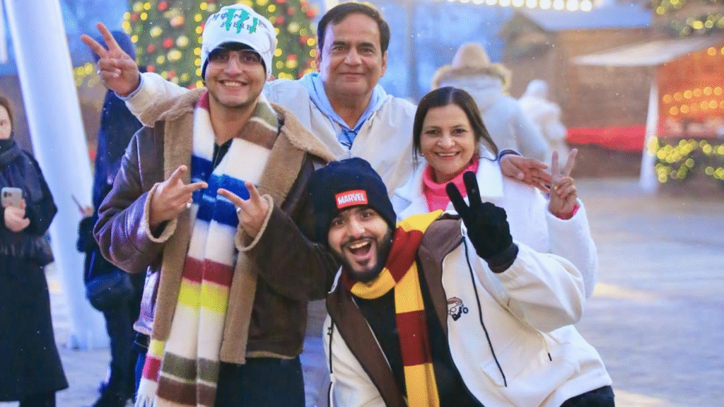 Fukra Insaan net worth image featuring Fukra Insaan with his family in a candid winter setting